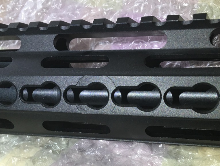 A picture containing sitting, different, laying, knife

Description automatically generated